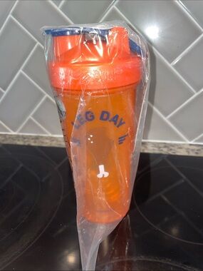 BlenderBottle Orange 'Leg Day' Shaker Bottle - Blue Accent
